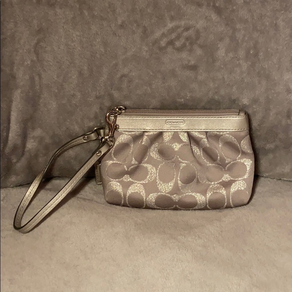Coach silver fabric monogrammed coach wristlet. 🎀